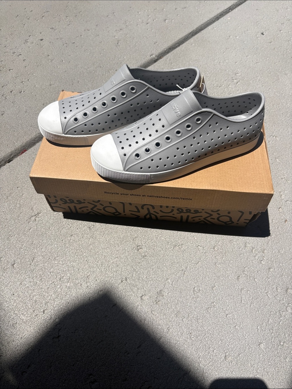 BRAND NEW, Gray Slip-On Natives, size 10 in men’s